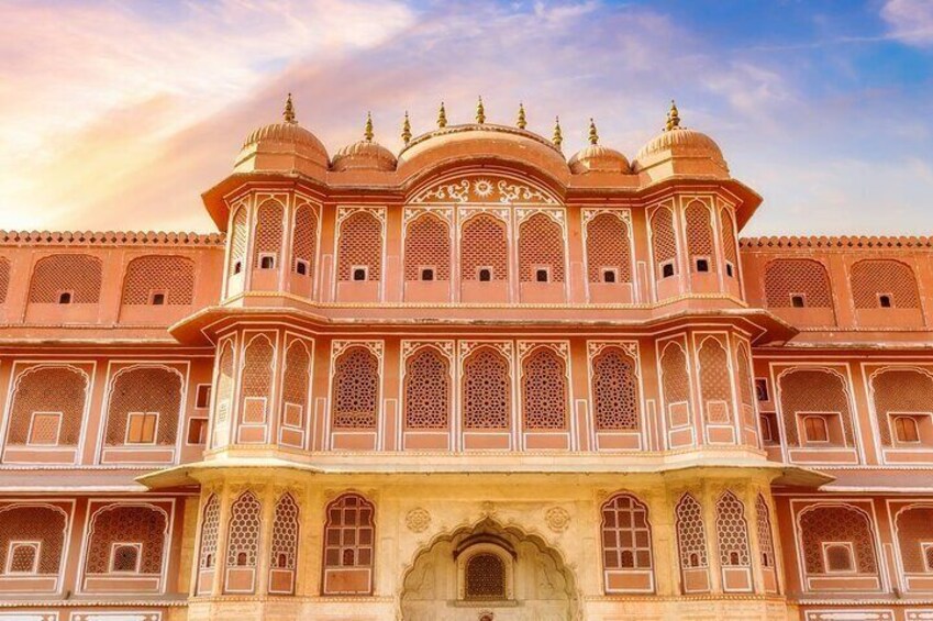 A grand building with ornate arches and domes. 1