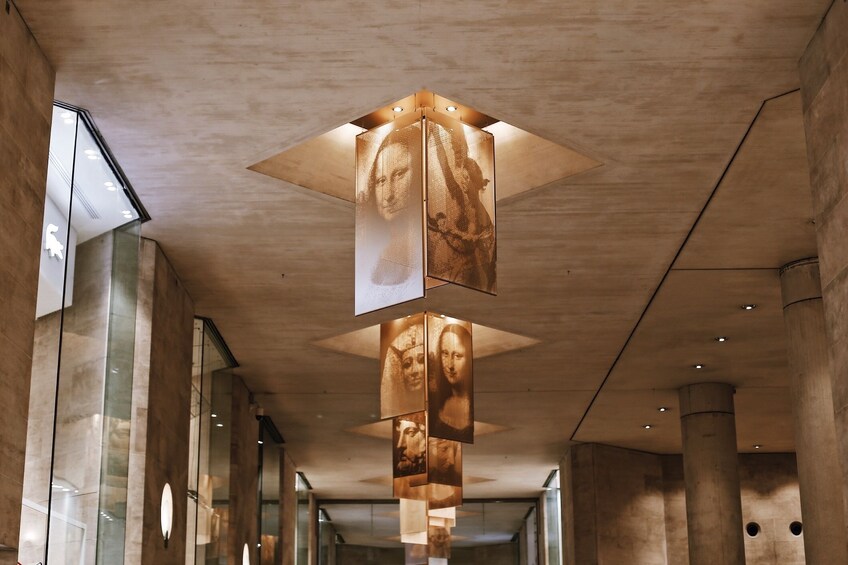 Artistic decor on the ceiling of the Louvre Museum in Paris