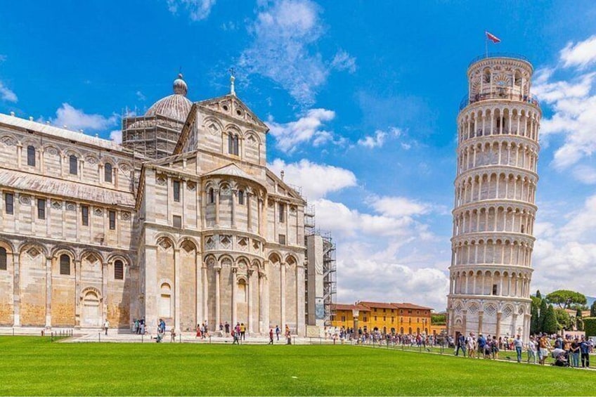 A large cathedral and the Leaning Tower of Pisa. 1