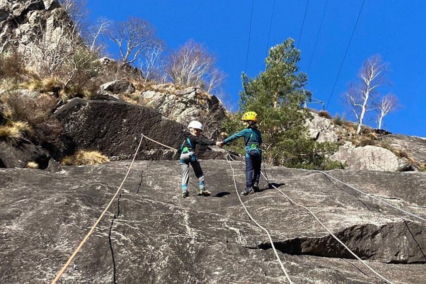 Family rock climbing near Locarno 1