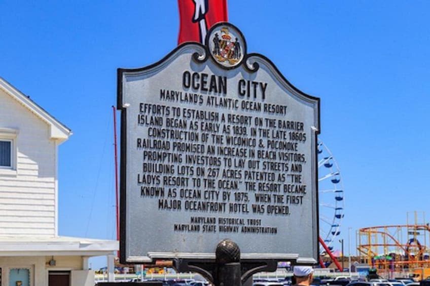 A historical signboard with text about Ocean City's history and attractions. 5