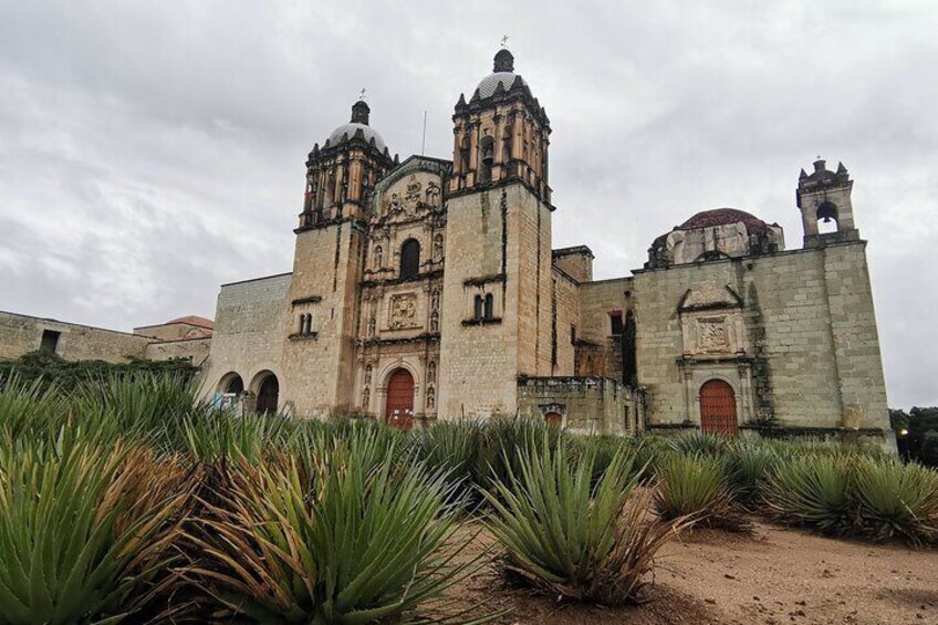 A historic church with two bell towers and a large dome. 3