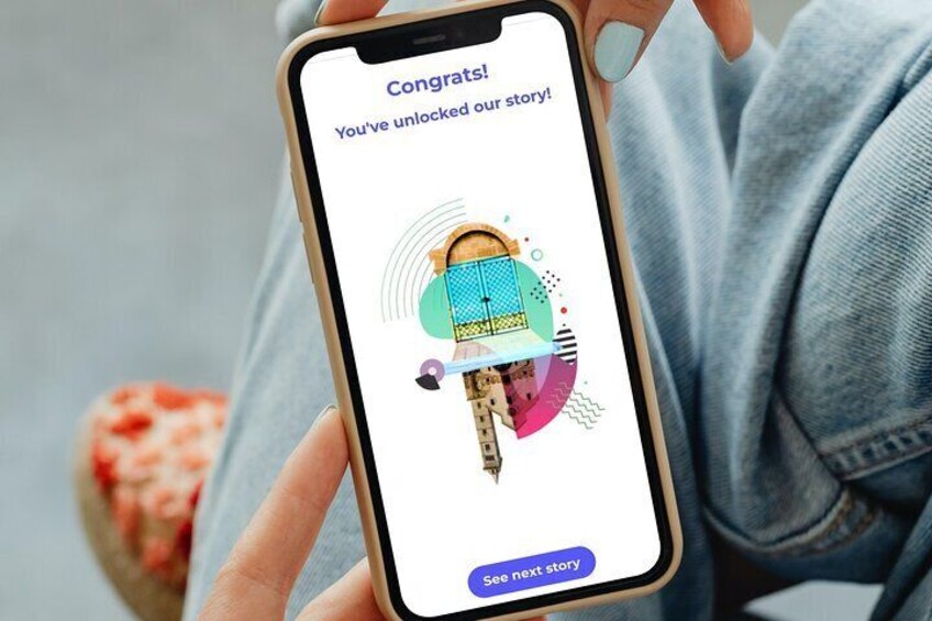 A person holding a smartphone displaying a congratulatory message and a colorful illustration. 4