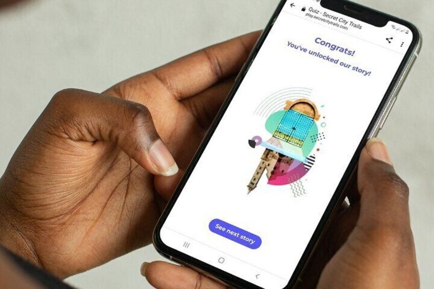 A person holding a smartphone displaying a congratulatory message and a padlock graphic. 5