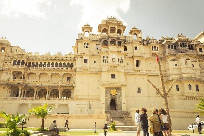 A historic building with multiple arches and a central entrance. 2