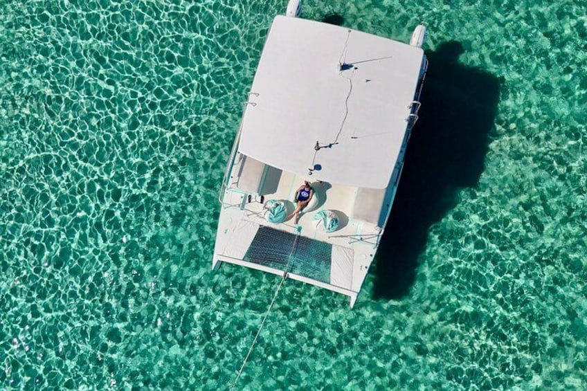 A boat on clear turquoise water. 2