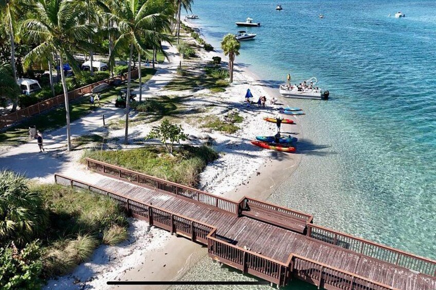 Scenic views of Peanut Island’s beaches and boardwalk as we arrive at the sandbar. 2