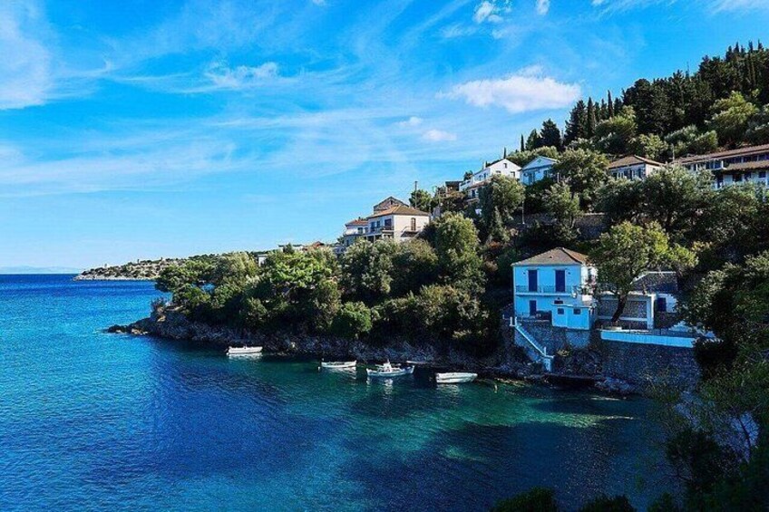 A coastal village with houses on a hillside overlooking the sea. 3