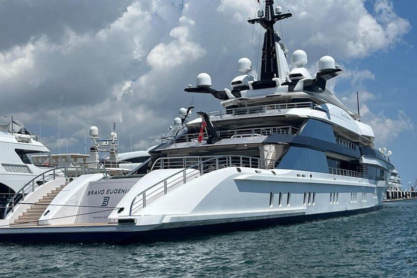 See the mega yachts as we pass by one of the largest mega yacht marinas in the world 2