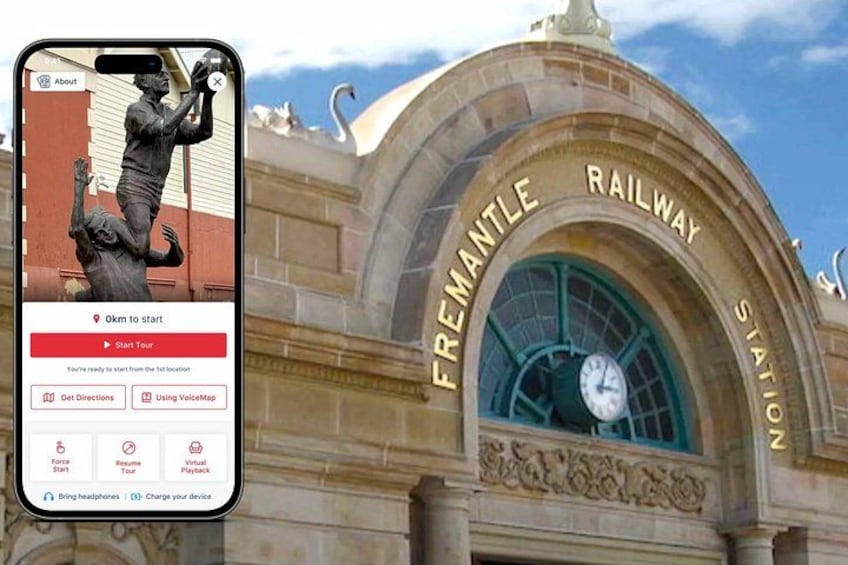 A smartphone displaying a map with a statue, a clock, and the text 'FREMANTLE RAILWAY STATION' on a building. 1