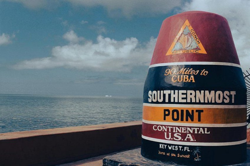 A buoy with text indicating it is the Southernmost Point in the Continental U.S.A. 5