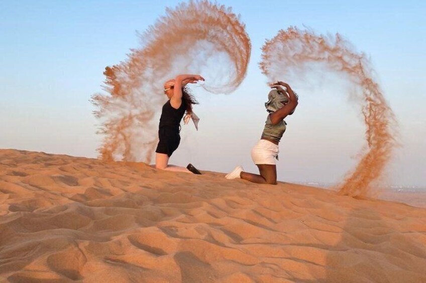 Dubai Red Dune Safari 4X4 Pickup Camel ride and BBQ Dinner 3