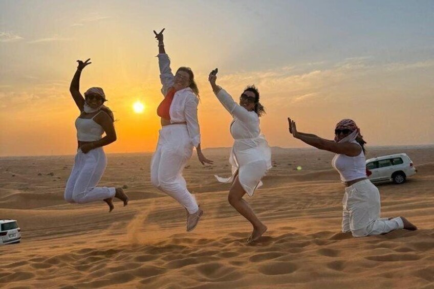 Dubai Red Dune Safari 4X4 Pickup Camel ride and BBQ Dinner 5