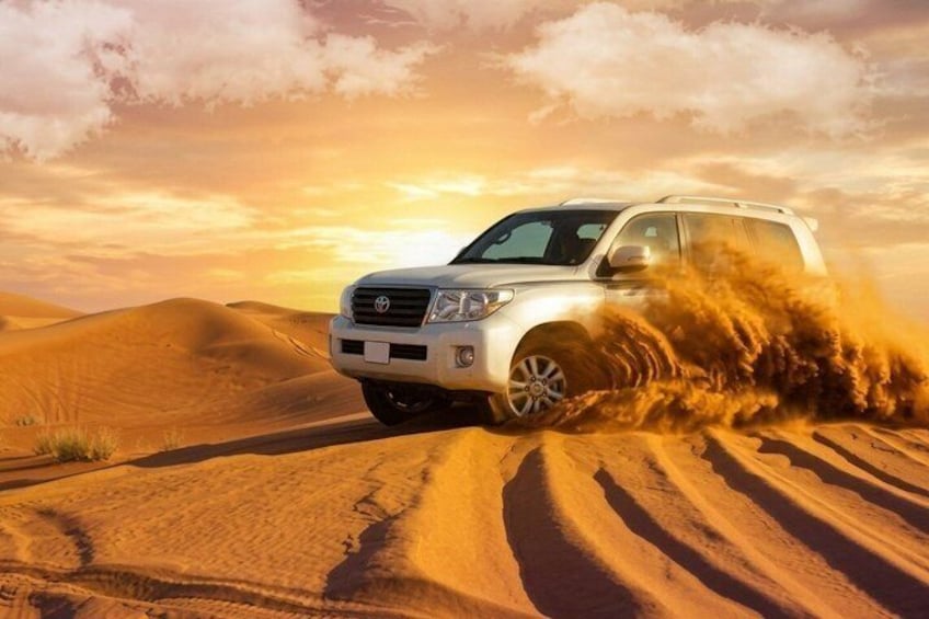 Dubai Desert Safari 4x4 Dune Bashing, Camel Ride and BBQ Dinner 1