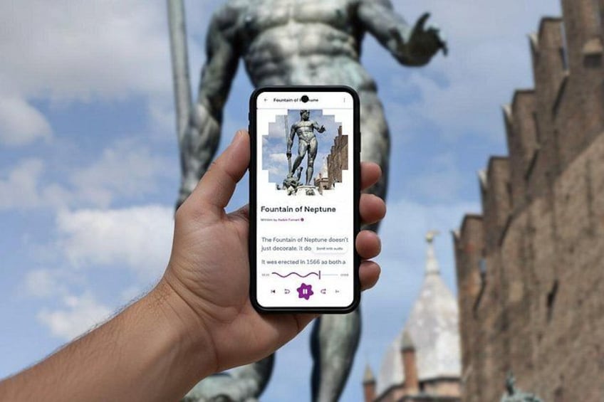 A hand holding a smartphone with a photo of the Fountain of Neptune, a statue, and a building in the background. 1