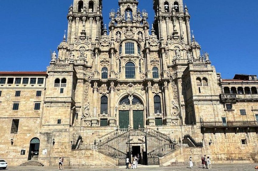 A large ornate cathedral with a central dome, multiple towers, and a grand entrance. 1