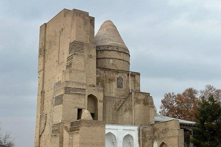 A historic building with a large dome and a tall tower. 4