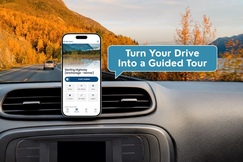 A smartphone mounted on a car dashboard displaying a guided tour app for Sterling Highway. 3