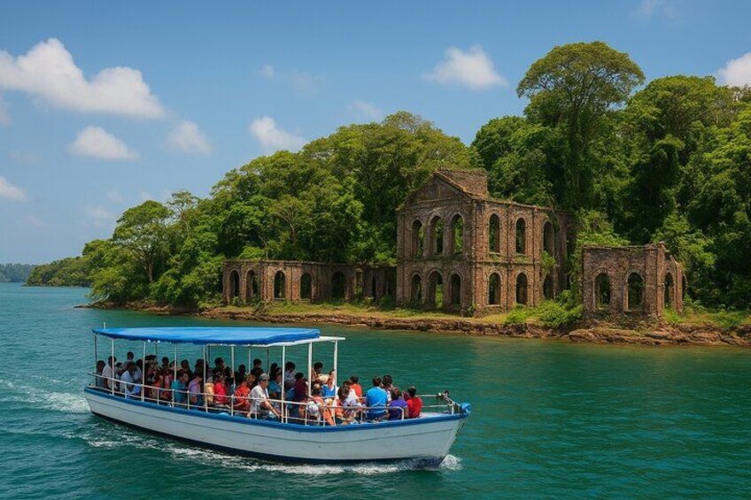 A boat with passengers, a large brick structure, and a forested island. 1