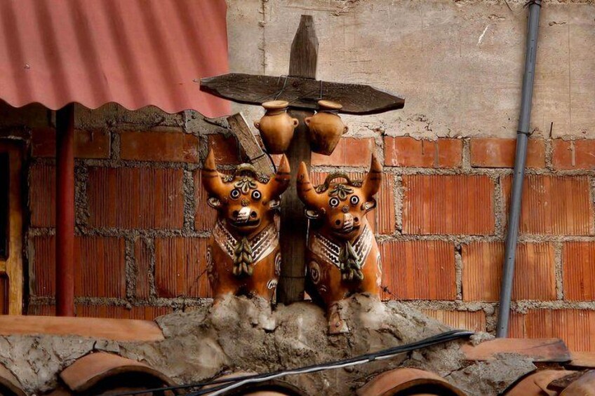 Curious bulls on the roof — many more can be found around the area. 2