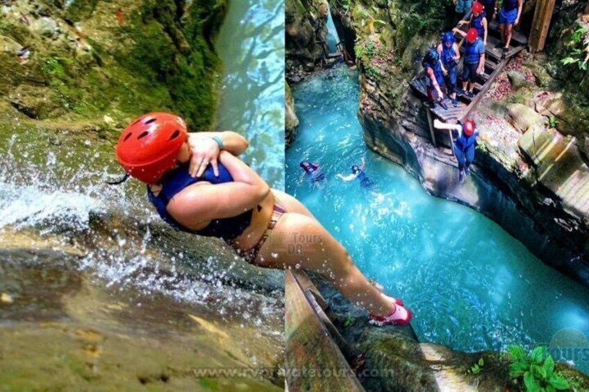 Eine Person mit rotem Helm und blauer Badeanzug springt von einer Klippe in einen Fluss. 2
