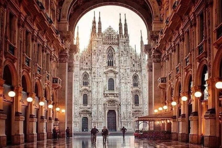 A grand cathedral with intricate Gothic architecture, large arched windows, and a central entrance. 2