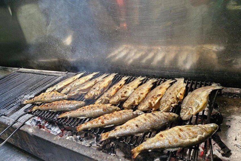 Grilled fish on a grill. 2