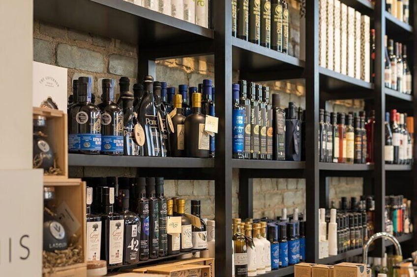 Shelves stocked with various liquor bottles in a store. 3