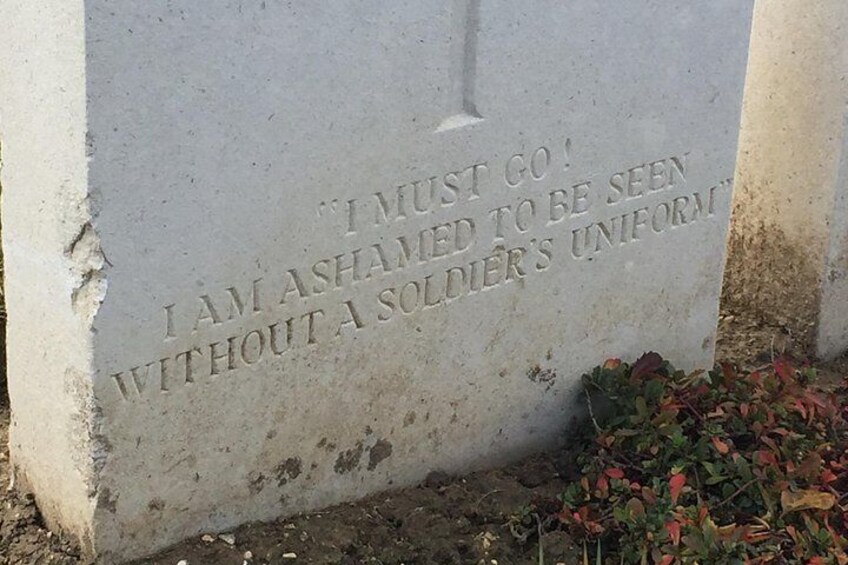A gravestone with an inscription. 4
