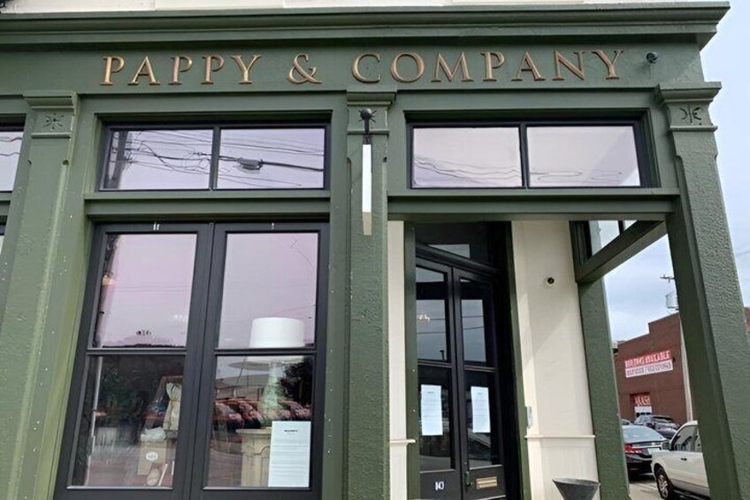 A green storefront with the sign 'PAPPY & COMPANY' above the entrance. 2