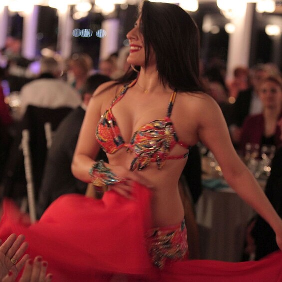 A person in a colorful outfit at a social event. 3