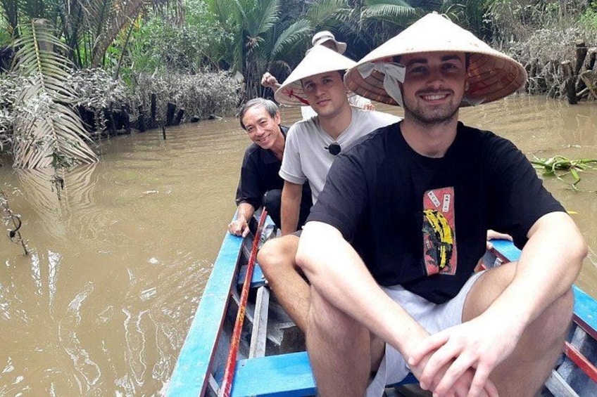 Ride a Sampan Boat on The Mekong River 1