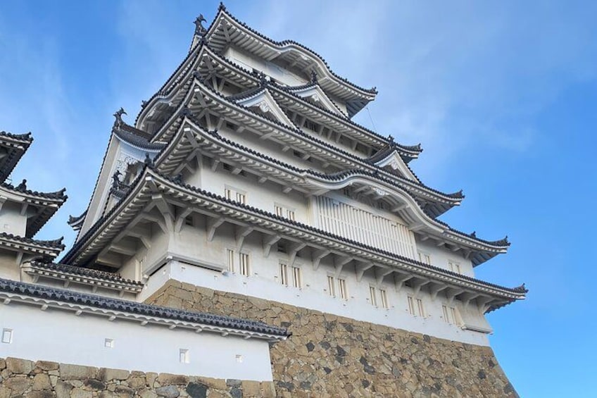 A traditional Japanese castle with multiple tiers and ornate roofs. 1