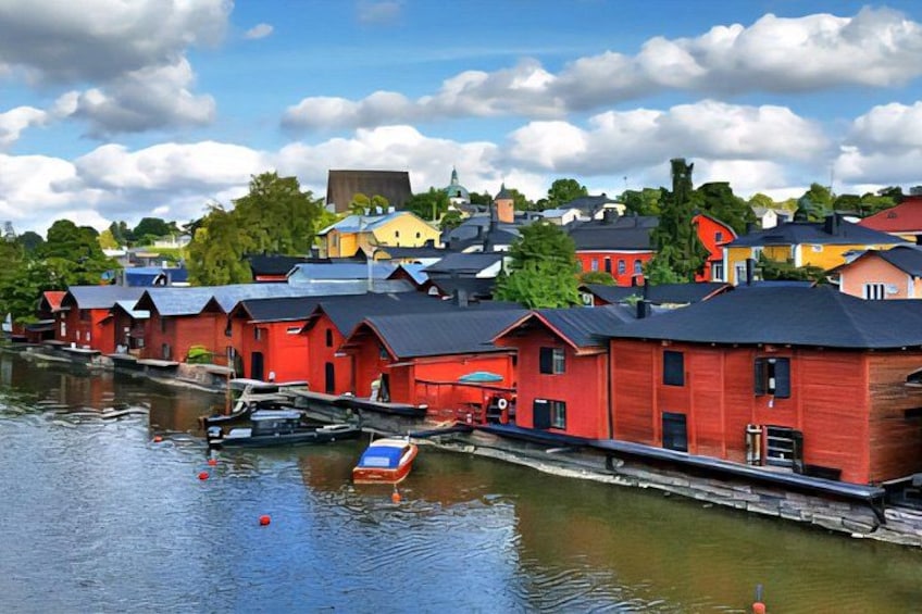 A waterfront with red buildings, a dock, and a small boat. 4