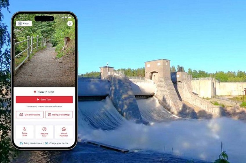 A smartphone displaying a tour app with a dam and water flow. 1