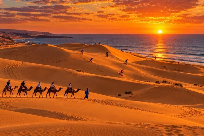 A desert landscape with sand dunes and a sunset over the ocean. 2