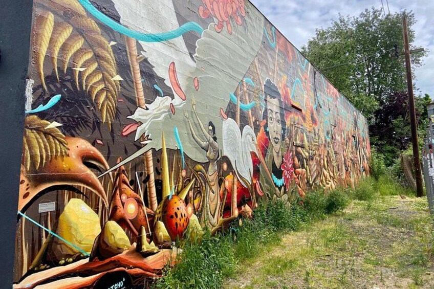 murals adorn most of the buildings on the street 2