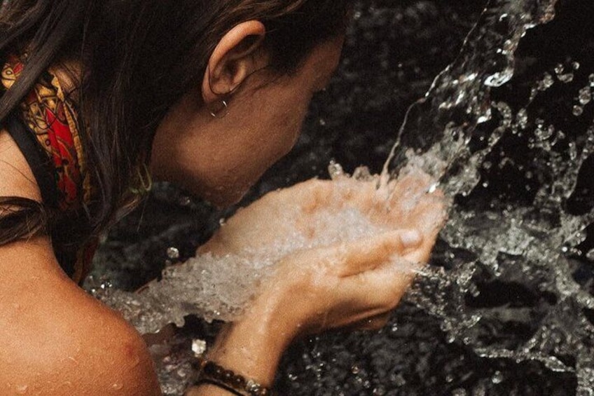 A person holding water. 2