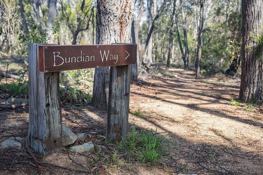 A wooden signpost with the text 'Bundian Way' pointing to the right. 2