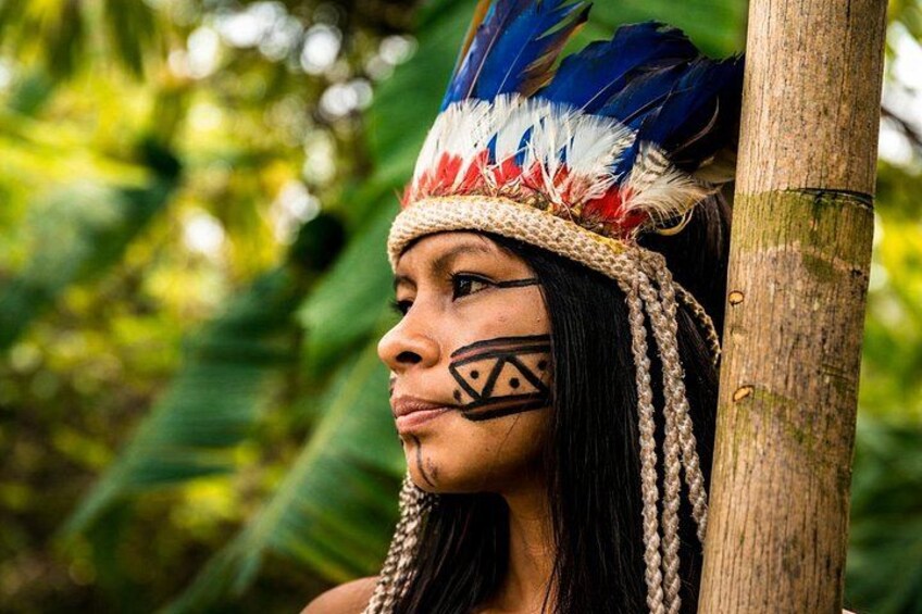 Bora portrait: traditional face paint and feather headdress in the Amazon. 2
