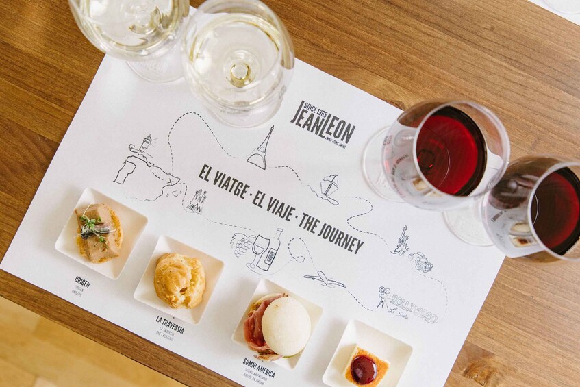 A menu with food and wine pairings on a wooden table. 1