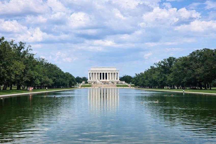 The Lincoln Memorial with a reflecting pool in front. 3
