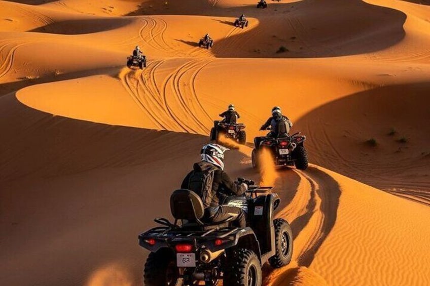 Off-road vehicles on a sandy dune landscape. 3