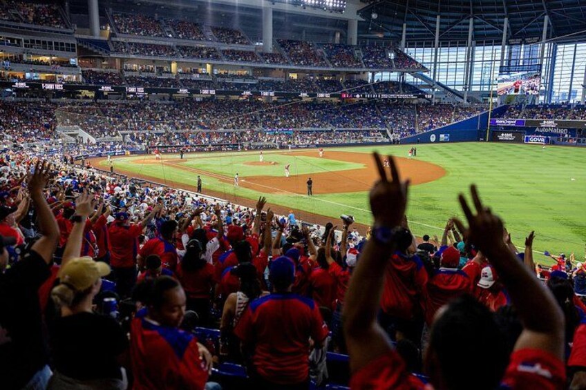 A baseball stadium filled with spectators. 4