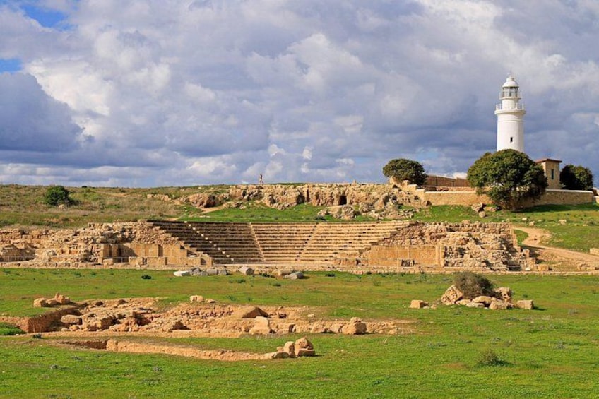 Ancient ruins, a lighthouse, and a grassy landscape. 1