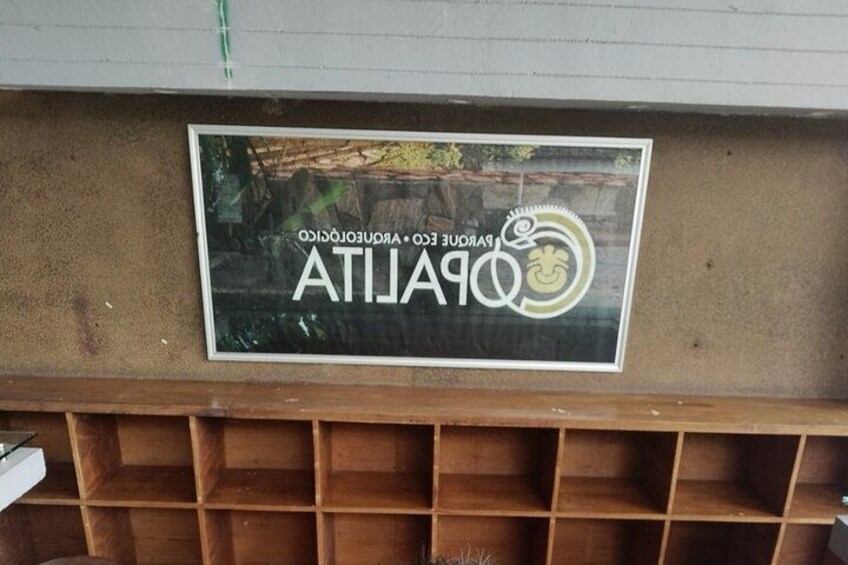 A sign with the text "ATILA" and a logo. 4