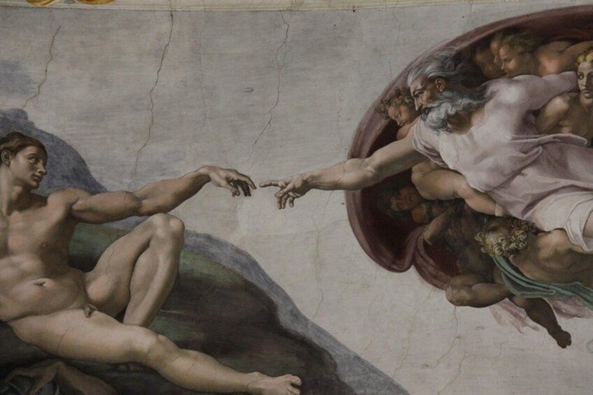 A fresco with a muscular figure reaching towards a group of figures in a circular arrangement. 2
