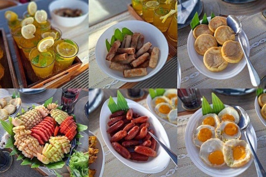 Una selezione di piatti tra cui un'insalata, salsicce e uova. 5