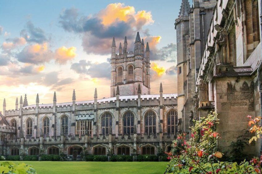 A historic building with a prominent tower and arched windows. 4
