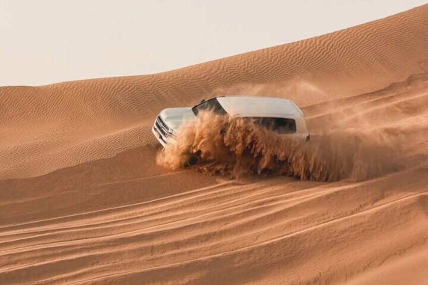Dubai Desert Safari with Dune Bashing, Camel Ride and BBQ Dinner 2